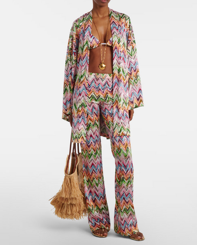 Flared pants with lace pattern and zigzag motif