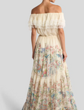 Long silk dress with placed flora and fauna print