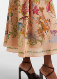 Long dress with placed flora and fauna print