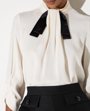 Blouse in georgette fabric with bow-tie